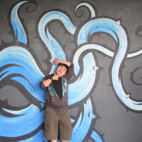 Posing with graffiti