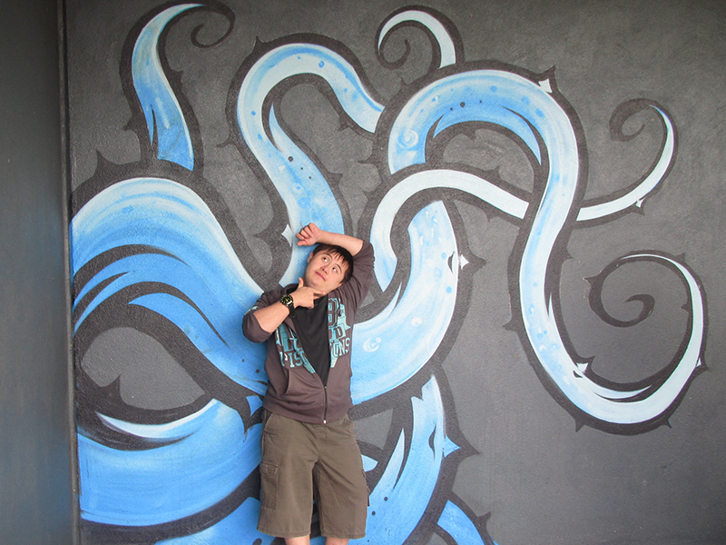Posing with graffiti